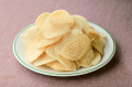 Calbee Kansai Aji Roman chipsy ziemniaczane o smaku solonym i Dashi, 60g | JaponiaCentralna.pl